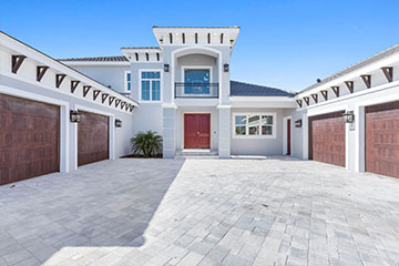 Entrance of intracoastal custom home by Stoughton & Duran